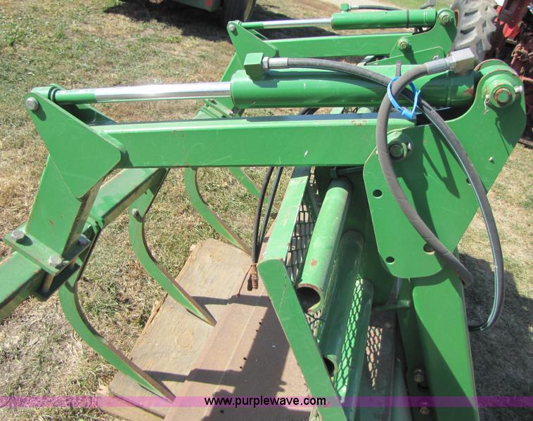 image for item C9547 98" loader bucket with five tine grapple