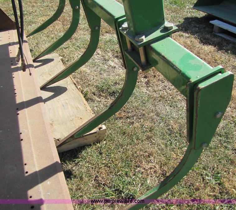 image for item C9547 98" loader bucket with five tine grapple