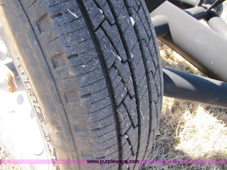 image for item C9597 2008 KWF eight bale hay trailer with Quick-tach hay spike