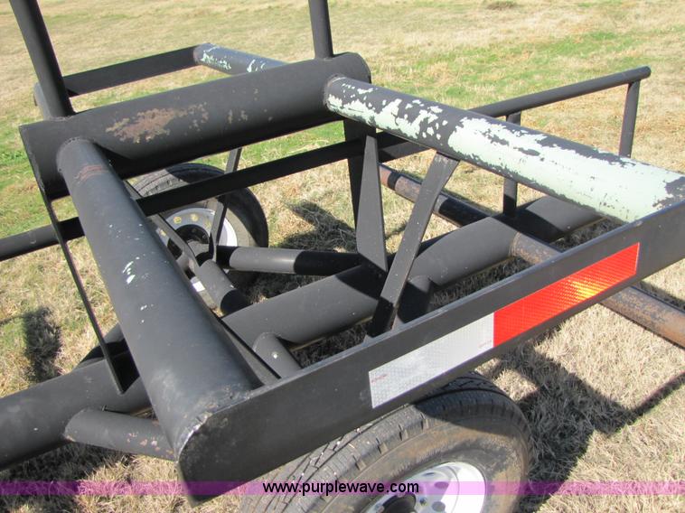 image for item C9597 2008 KWF eight bale hay trailer with Quick-tach hay spike