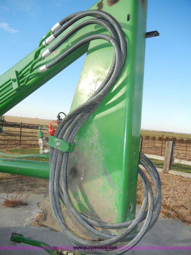 image for item H9089 John Deere 725 loader with bucket and bale spear