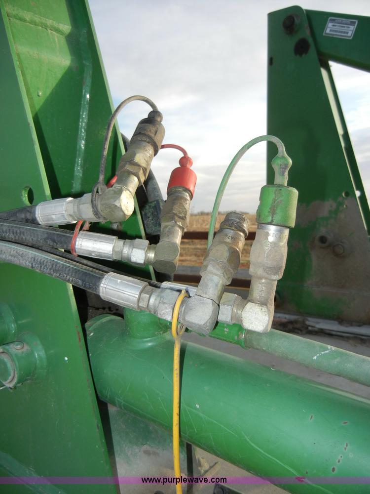 image for item H9089 John Deere 725 loader with bucket and bale spear