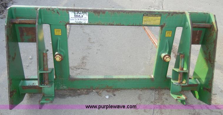 image for item H9089 John Deere 725 loader with bucket and bale spear