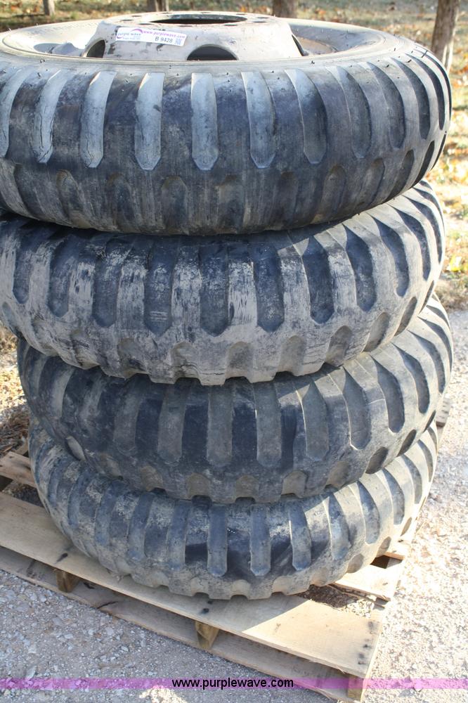 image for item B9428 (4) 11.00-20 tires and wheels