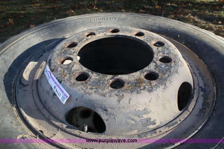 image for item B9428 (4) 11.00-20 tires and wheels