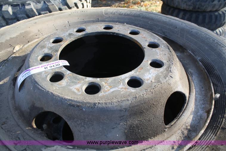 image for item B9430 (4) 11.00-20 tires and wheels