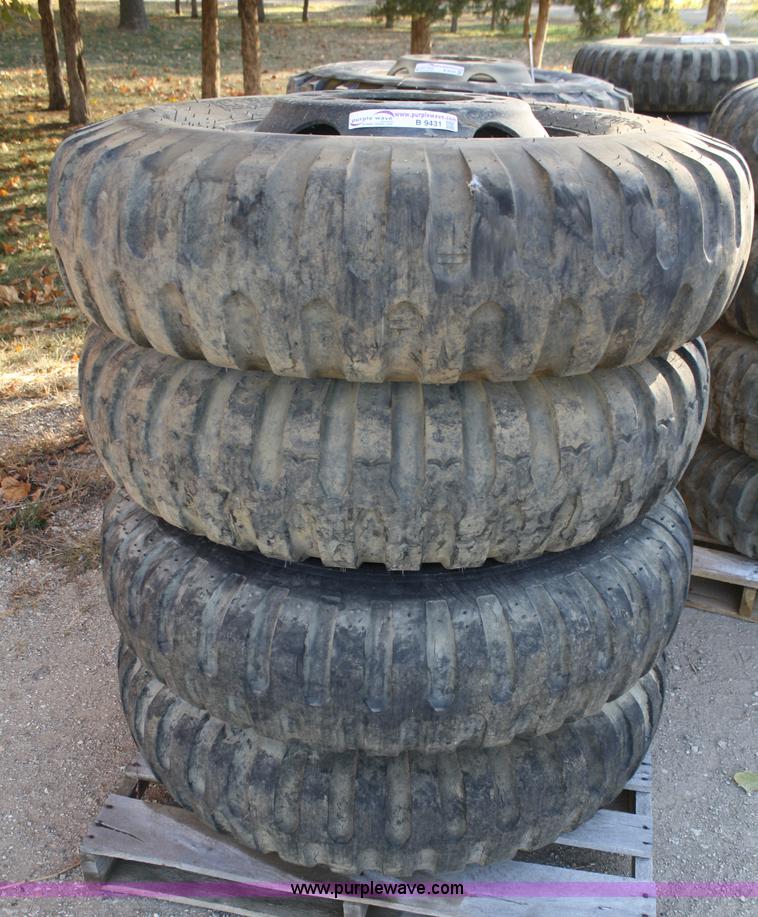 image for item B9431 (4) 11.00-20 tires and wheels