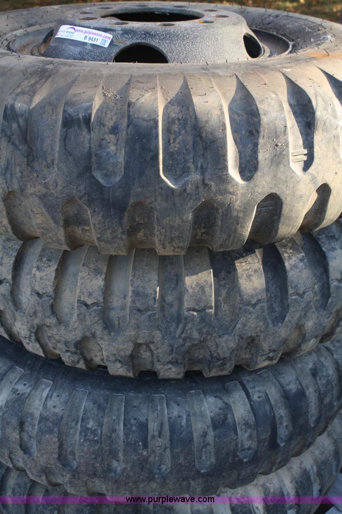 image for item B9431 (4) 11.00-20 tires and wheels
