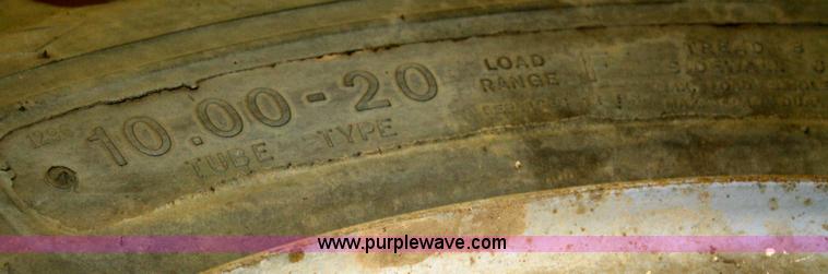 image for item B9432 (4) 10.00-20 tires and wheels