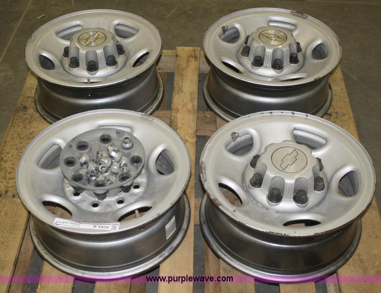 image for item B9434 (4) 16" wheels with lug nuts and hub caps