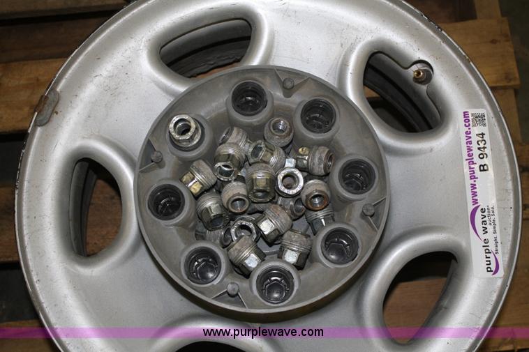 image for item B9434 (4) 16" wheels with lug nuts and hub caps