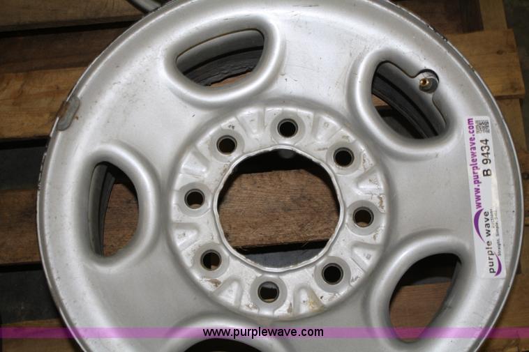 image for item B9434 (4) 16" wheels with lug nuts and hub caps