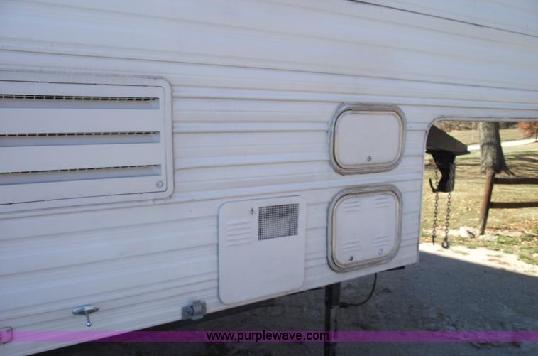 image for item C5709 2001 Forest River 26' toy hauler camper