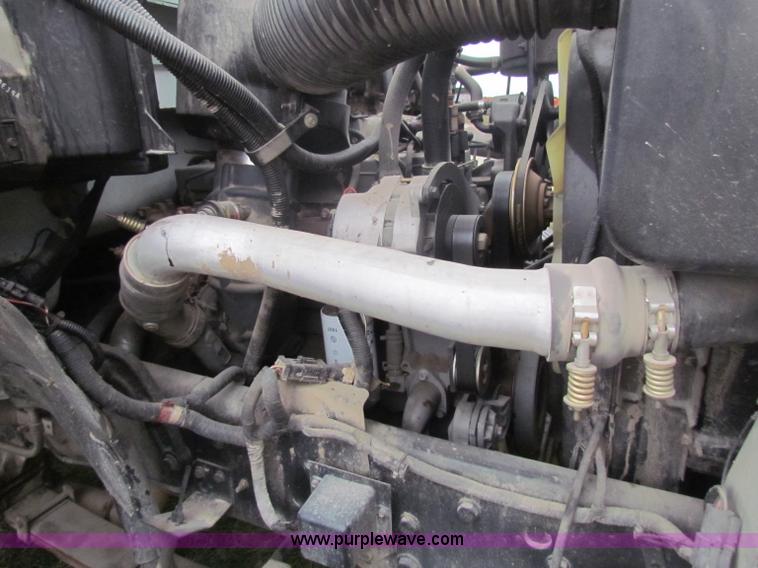 image for item B7009 1994 Ford F700 digger truck