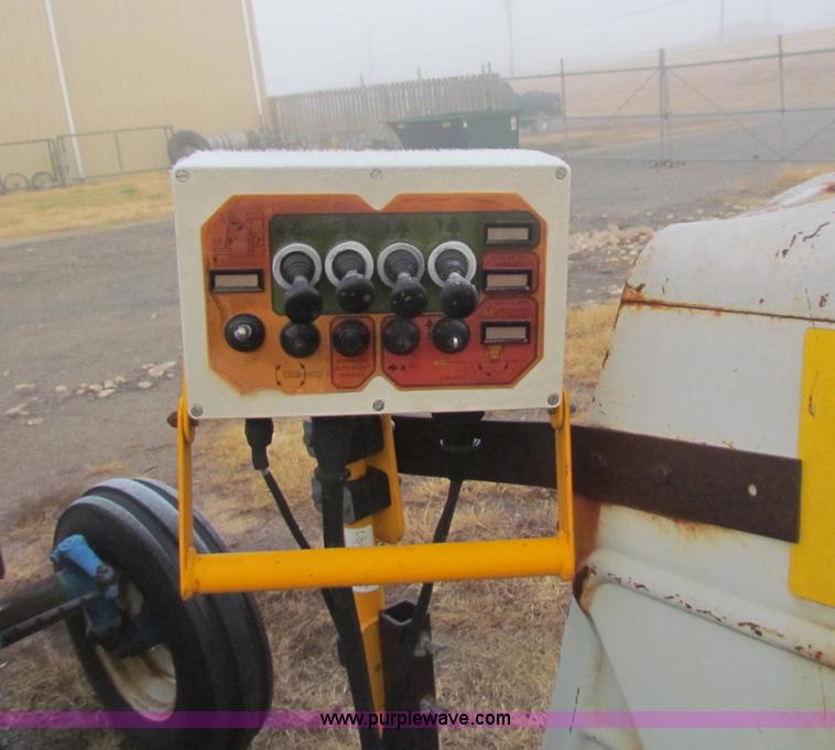 image for item B7018 1986 Ford 5900 tractor with flail boom mower