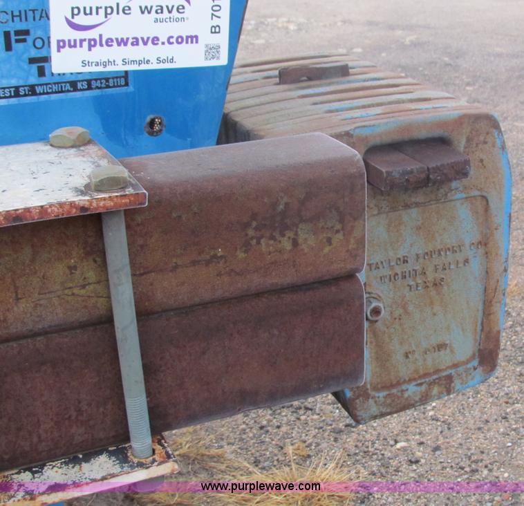 image for item B7018 1986 Ford 5900 tractor with flail boom mower