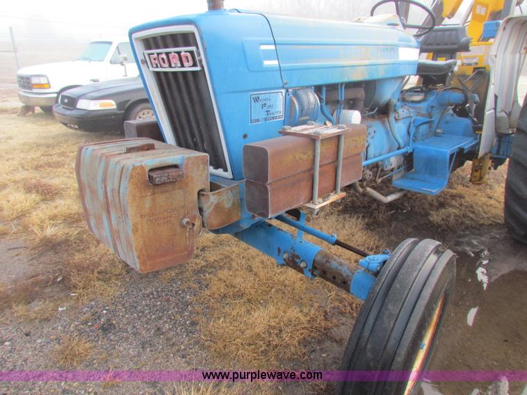 image for item B7018 1986 Ford 5900 tractor with flail boom mower