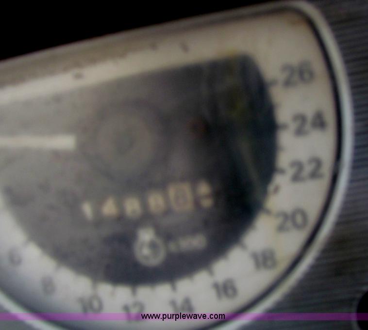 image for item B7018 1986 Ford 5900 tractor with flail boom mower