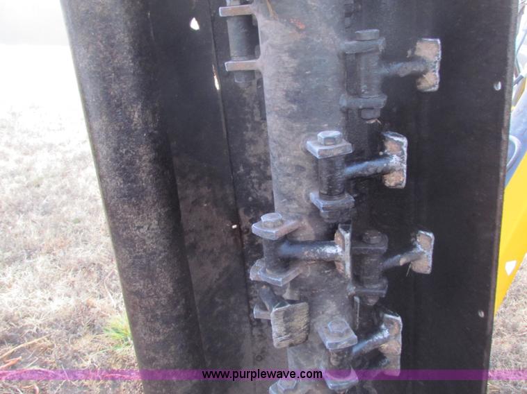 image for item B7018 1986 Ford 5900 tractor with flail boom mower