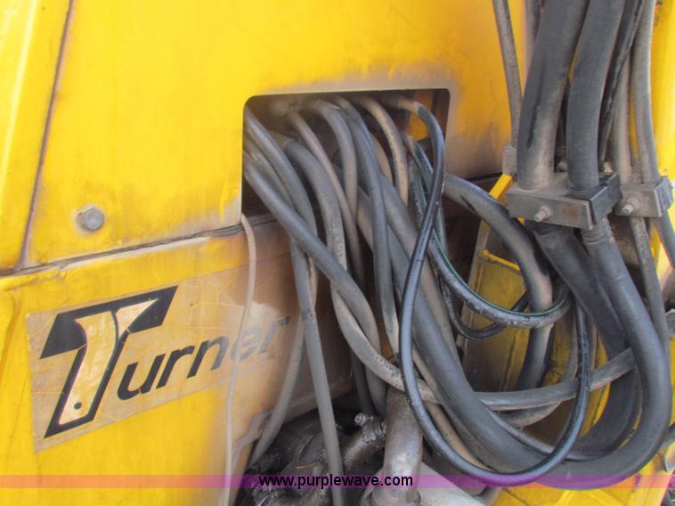 image for item B7018 1986 Ford 5900 tractor with flail boom mower