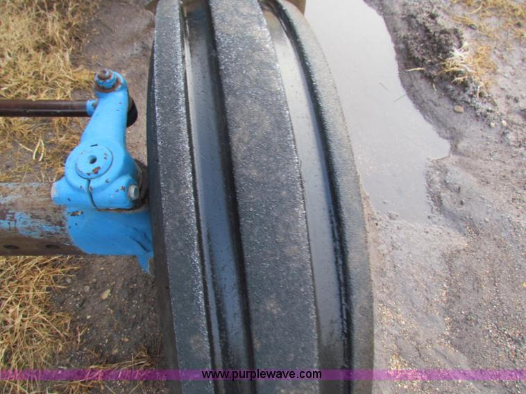 image for item B7018 1986 Ford 5900 tractor with flail boom mower