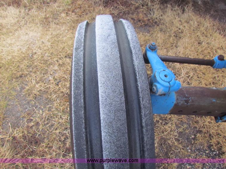 image for item B7018 1986 Ford 5900 tractor with flail boom mower