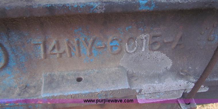 image for item B7018 1986 Ford 5900 tractor with flail boom mower