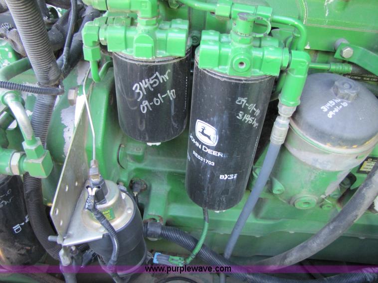 image for item A4615 2005 John Deere 9760 STS RWA combine