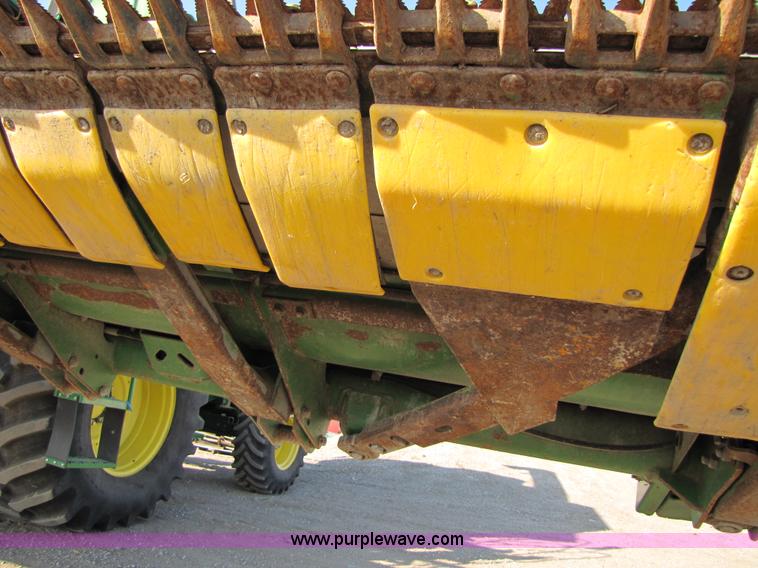 image for item B2002 2007 John Deere 635F 35' flex head