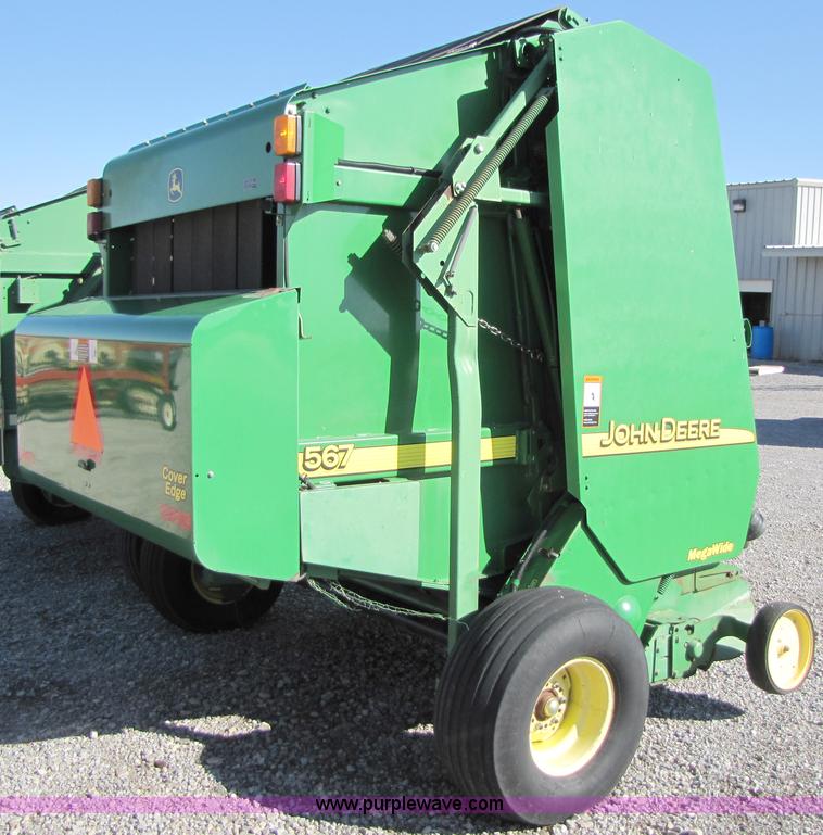 image for item B2017 2002 John Deere 567 round baler
