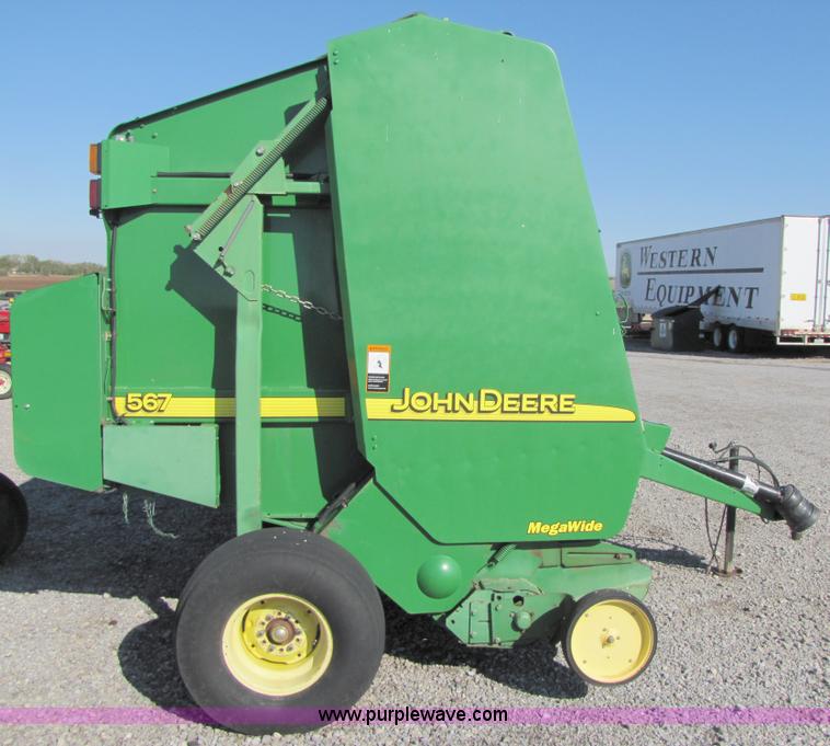 image for item B2017 2002 John Deere 567 round baler