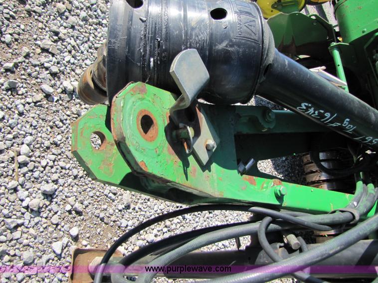 image for item B2017 2002 John Deere 567 round baler