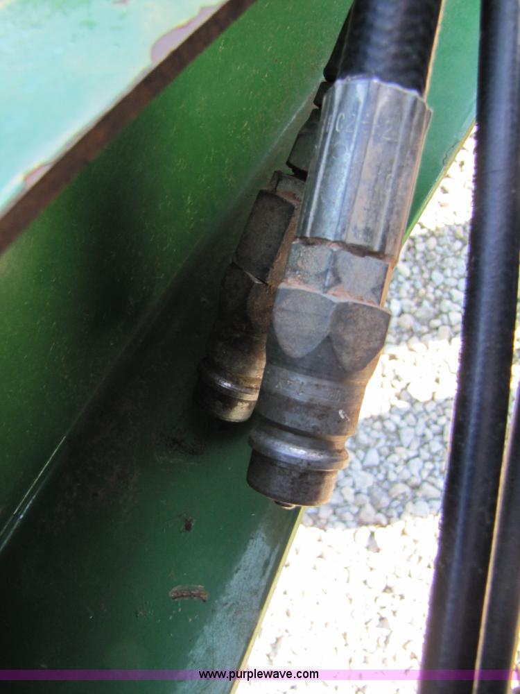 image for item B2017 2002 John Deere 567 round baler