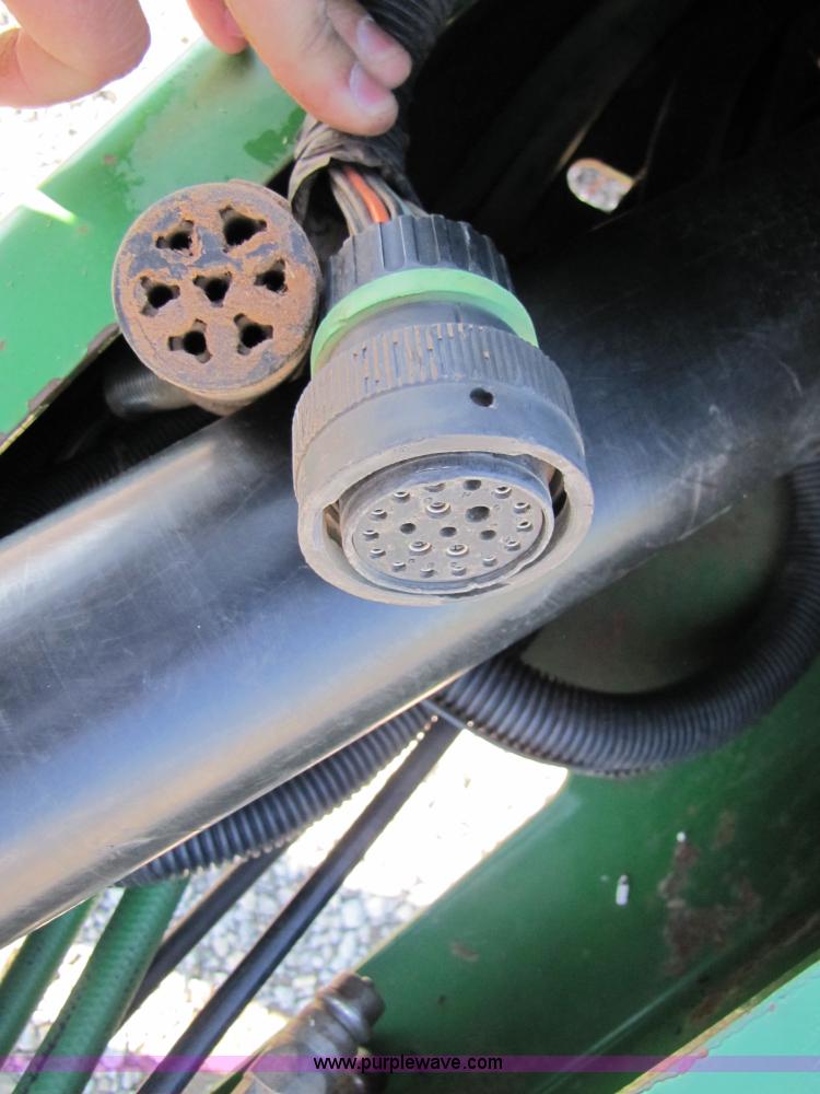 image for item B2017 2002 John Deere 567 round baler