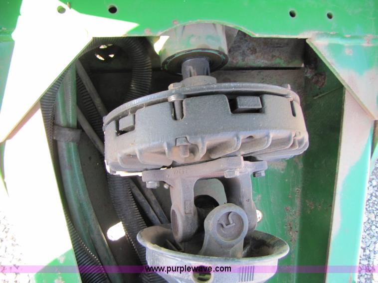 image for item B2017 2002 John Deere 567 round baler