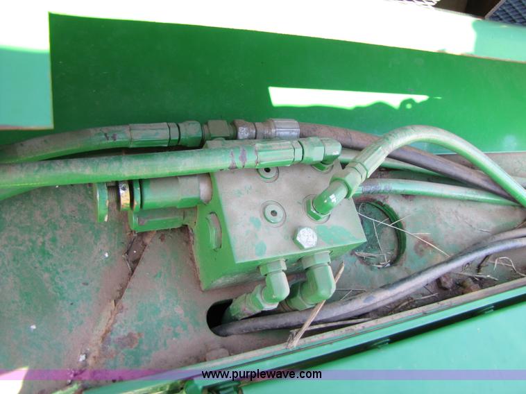 image for item B2017 2002 John Deere 567 round baler