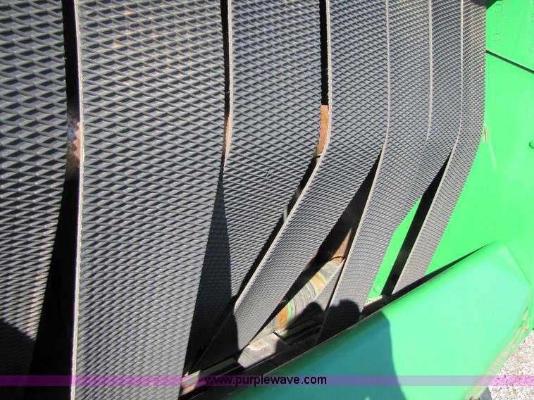 image for item B2017 2002 John Deere 567 round baler