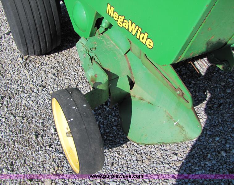 image for item B2017 2002 John Deere 567 round baler