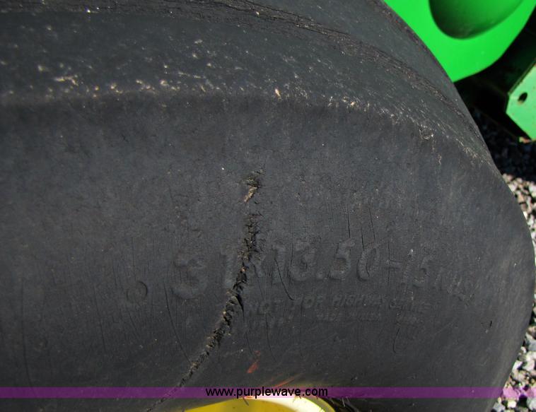 image for item B2017 2002 John Deere 567 round baler