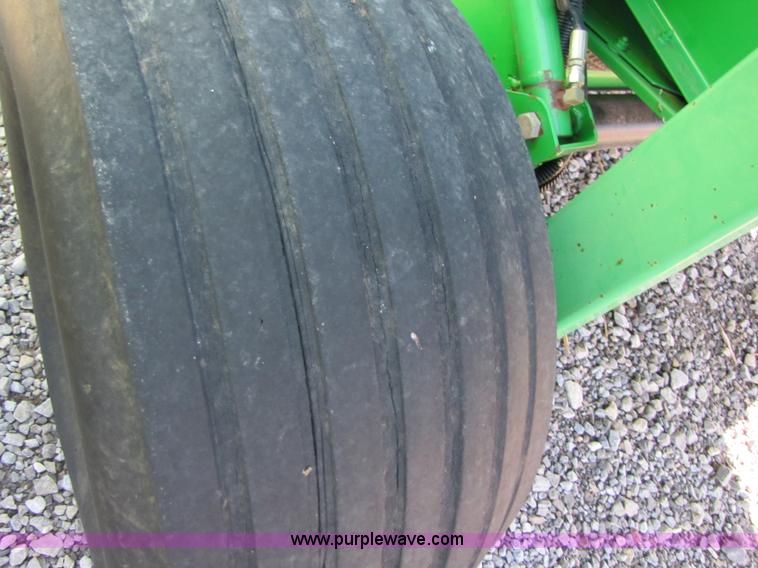 image for item B2017 2002 John Deere 567 round baler