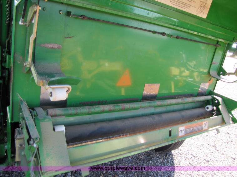 image for item B2017 2002 John Deere 567 round baler