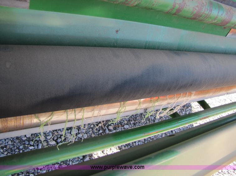 image for item B2017 2002 John Deere 567 round baler