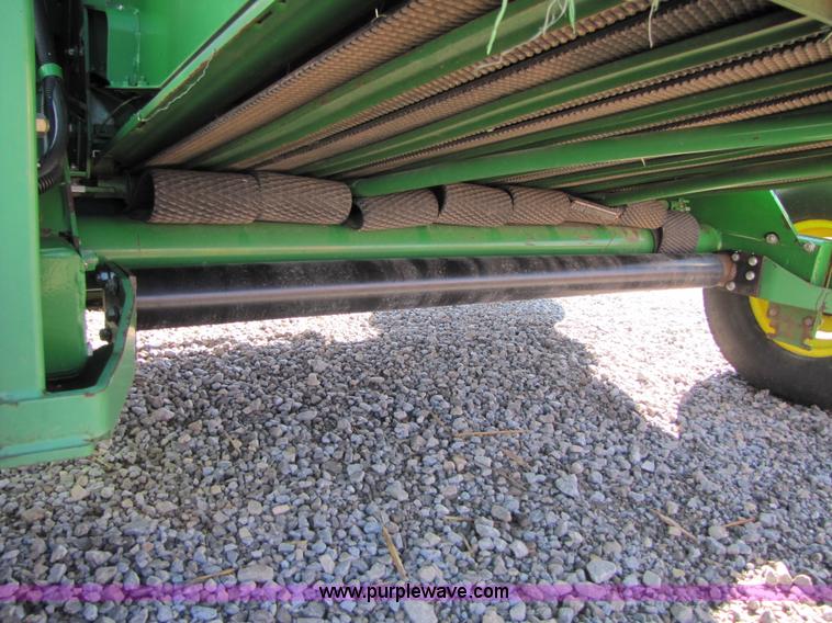 image for item B2017 2002 John Deere 567 round baler
