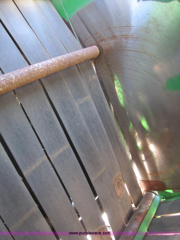 image for item B2017 2002 John Deere 567 round baler