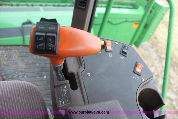 image for item B8652 2004 John Deere 4895 swather