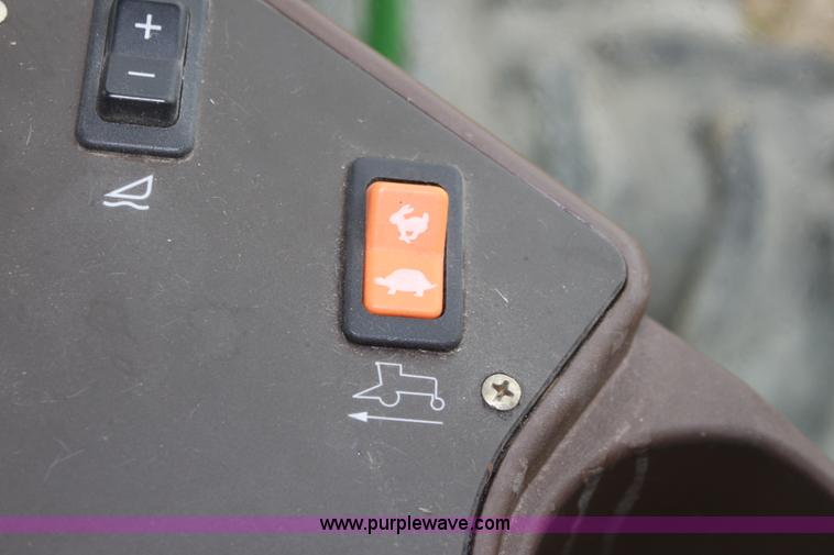 image for item B8652 2004 John Deere 4895 swather