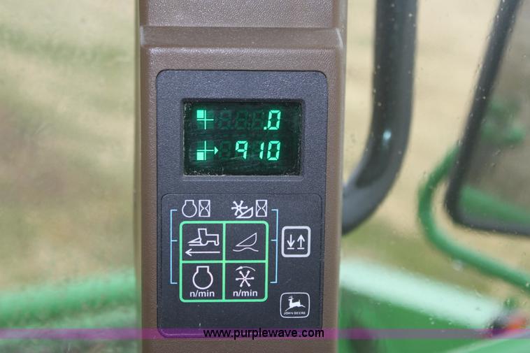 image for item B8652 2004 John Deere 4895 swather