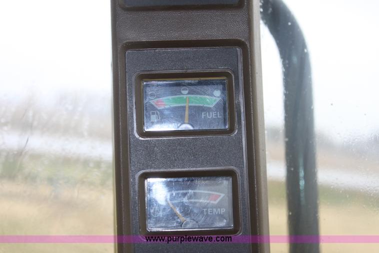 image for item B8652 2004 John Deere 4895 swather