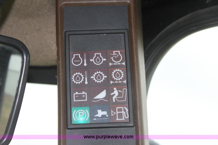 image for item B8652 2004 John Deere 4895 swather