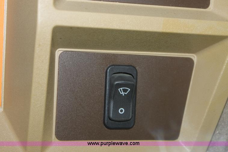 image for item B8652 2004 John Deere 4895 swather